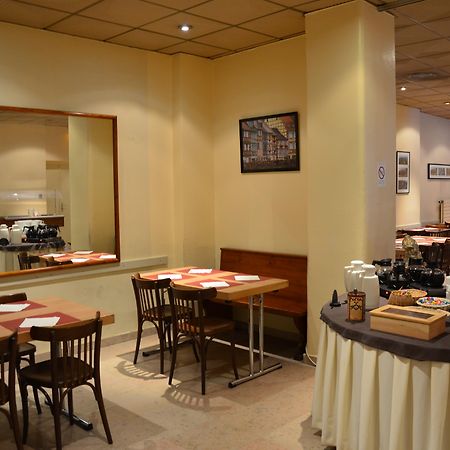 欧洲帽公寓式酒店 斯特拉斯堡 餐厅 照片